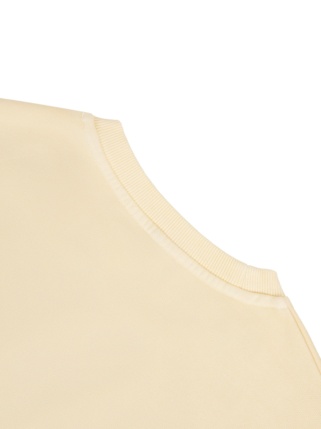 Vintage washed cropped sweatshirt by ODMPOD, soft fabric, relaxed fit, with faded style and casual neckline, displayed on a hanger.