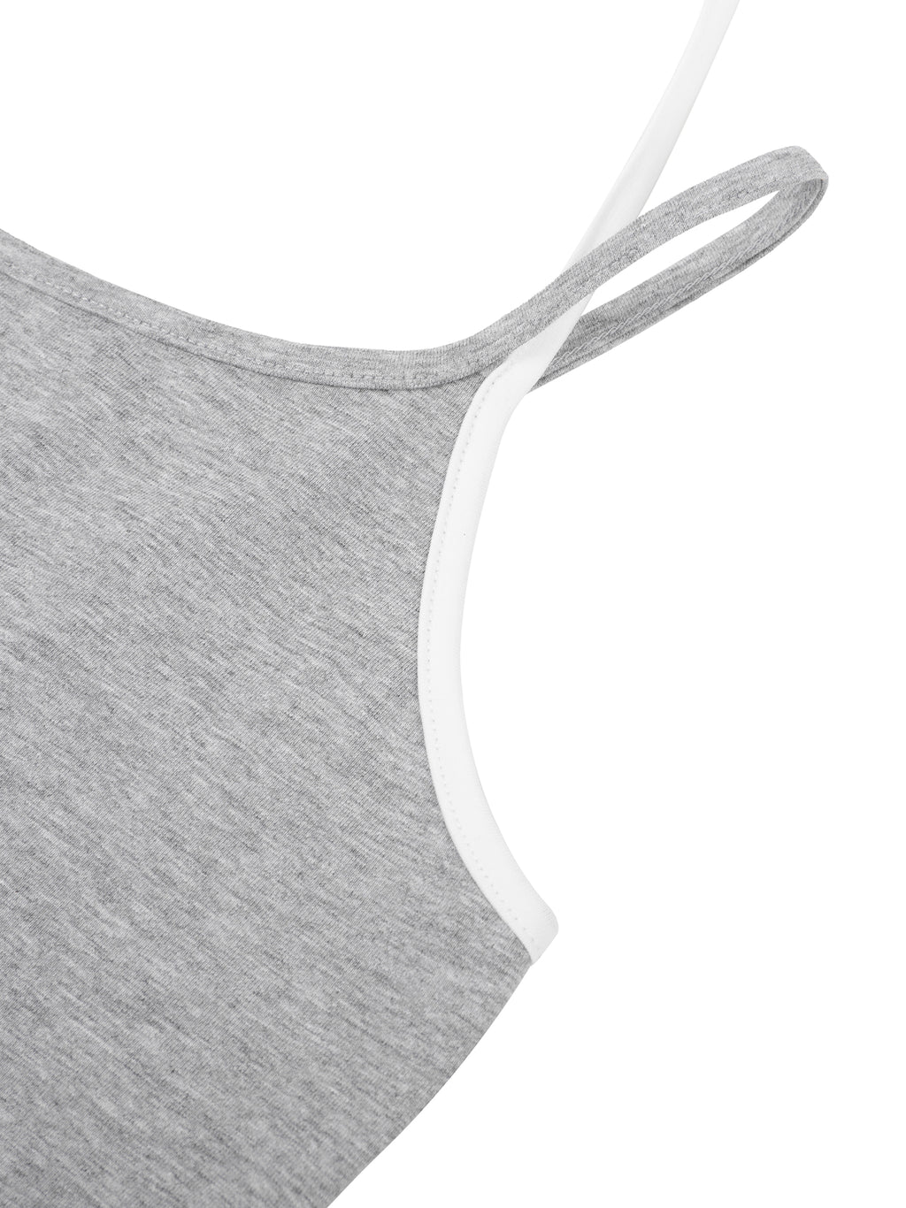 ODMPOD contrast binding halter tank top, black and white sleeveless top with stylish neckline, display of fabric details and fit.