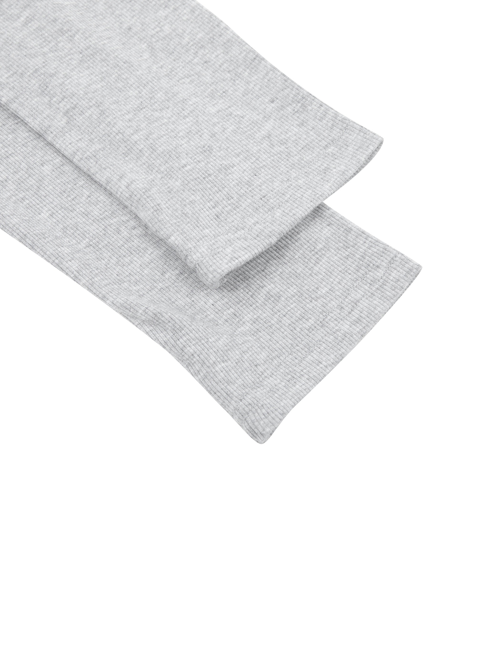 ODMPOD ruched long sleeve crop T-shirt showing fitted design with ruched details and long sleeves on a neutral background