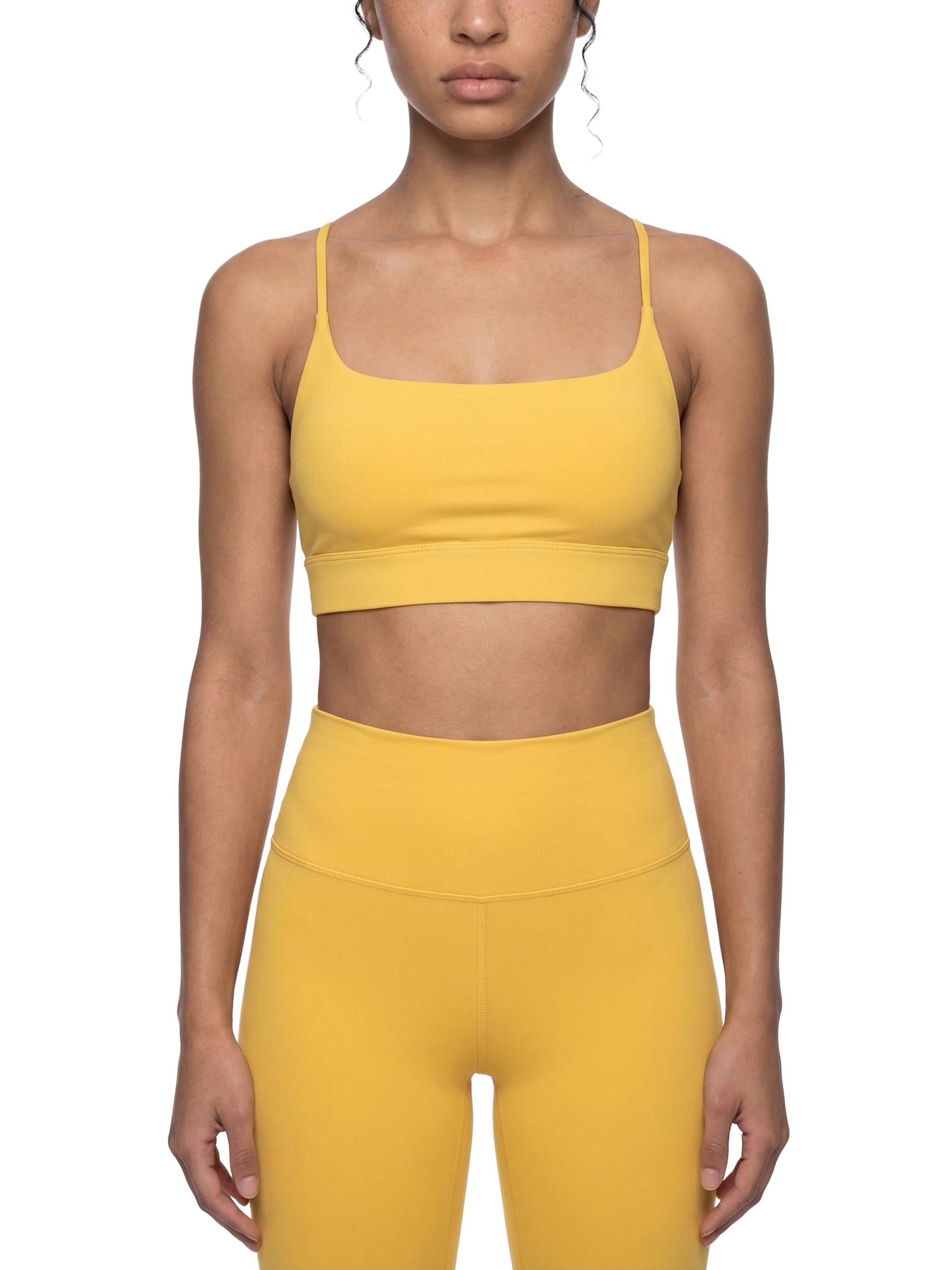 ODMPOD strappy criss cross yoga sports bra with supportive design and stylish straps, ideal for active workouts and exercise.