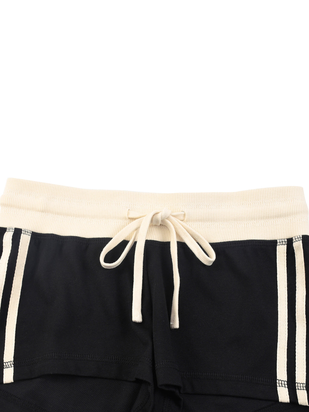 ODMPOD contrast stripe track shorts featuring sporty design and comfortable fit, shown in a casual outdoor setting.