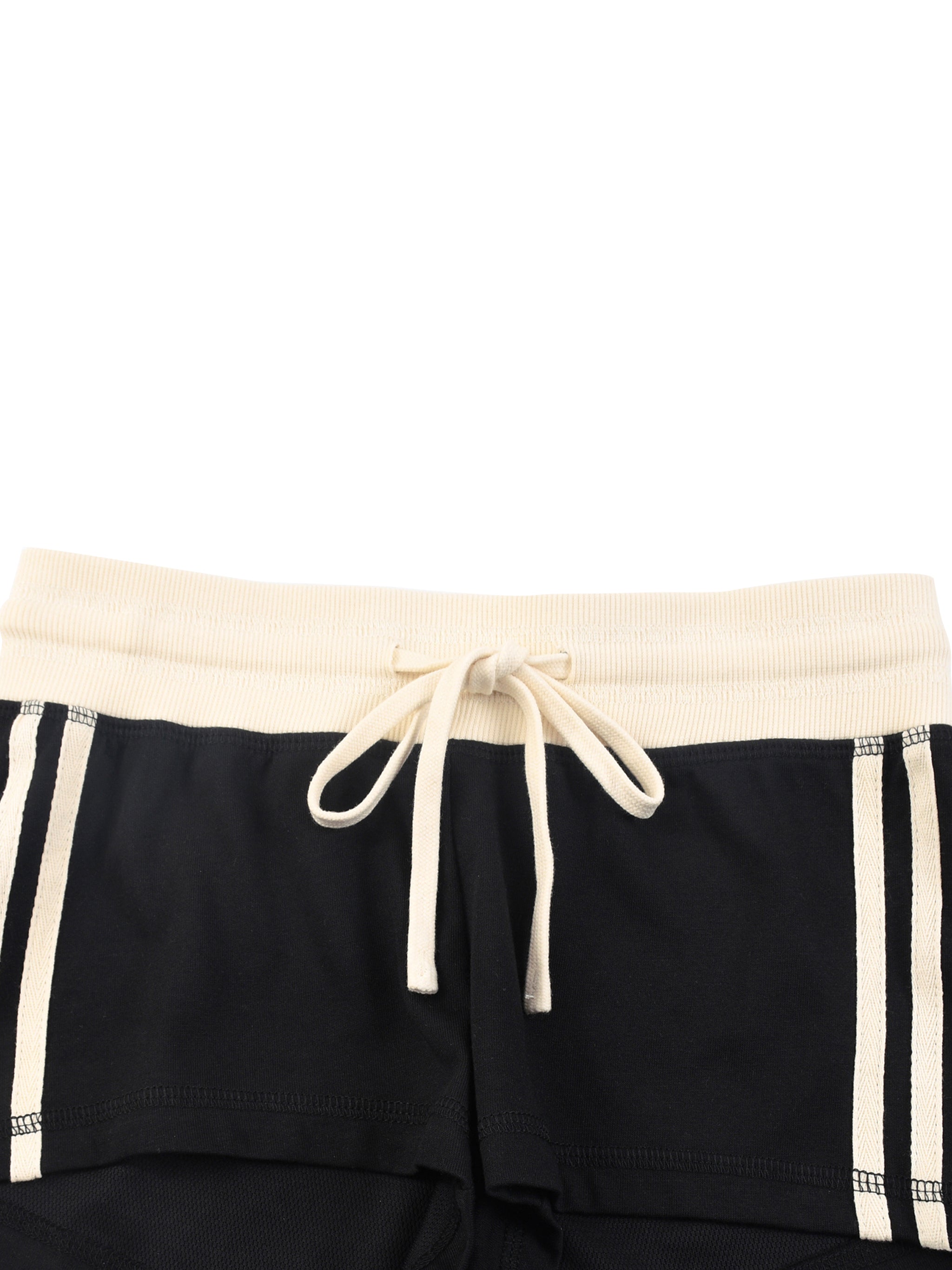 ODMPOD contrast stripe track shorts featuring sporty design and comfortable fit, shown in a casual outdoor setting.