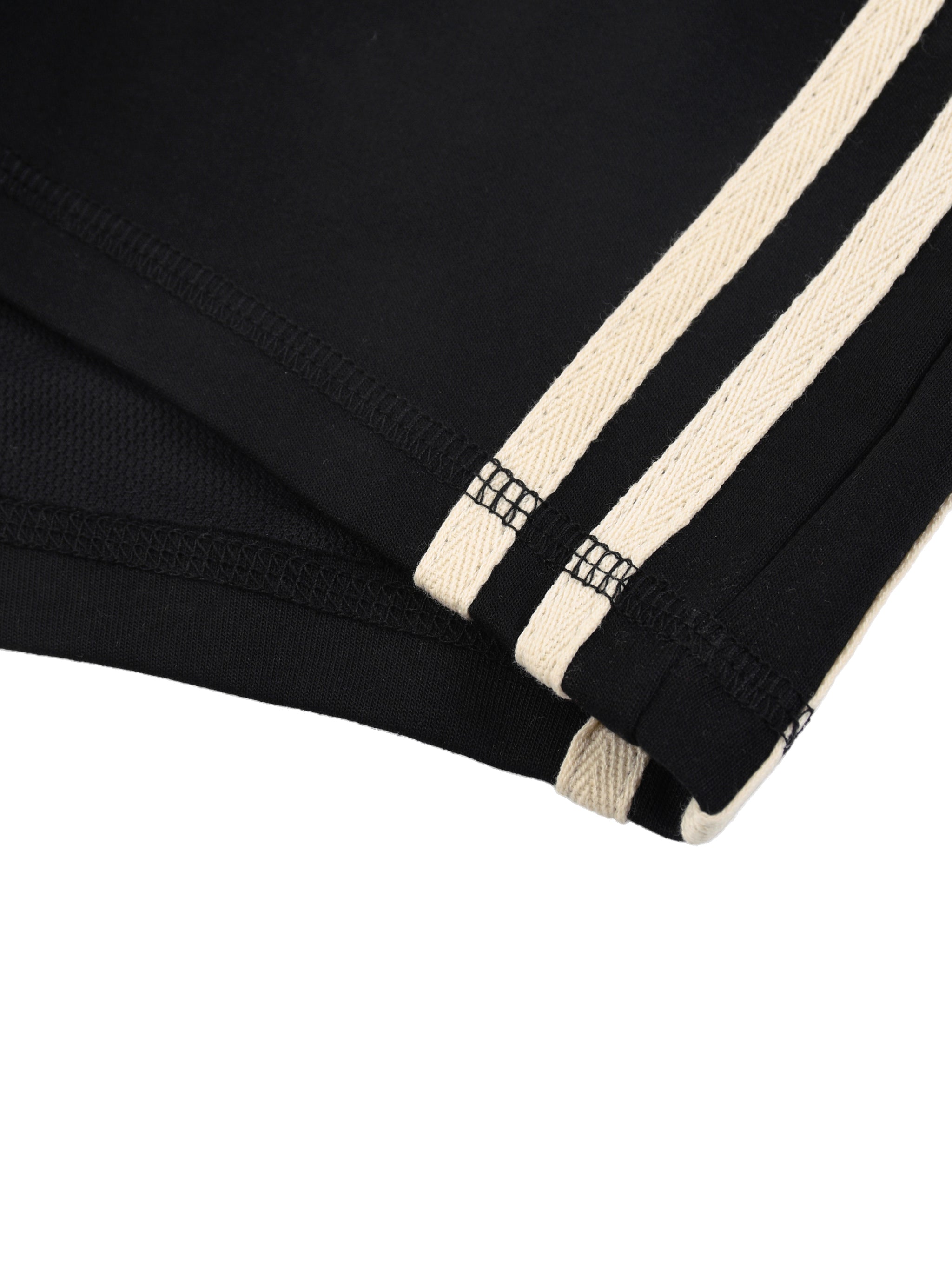 ODMPOD contrast stripe track shorts with black and white design, lightweight fabric, and sporty style for active wear.