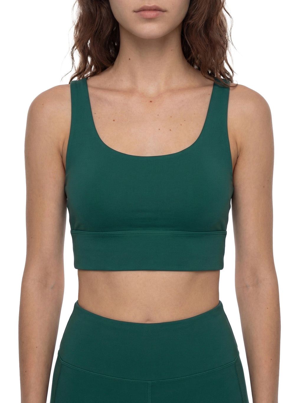 ODMPOD strappy criss-cross sports bra with supportive design, shown on a white background.