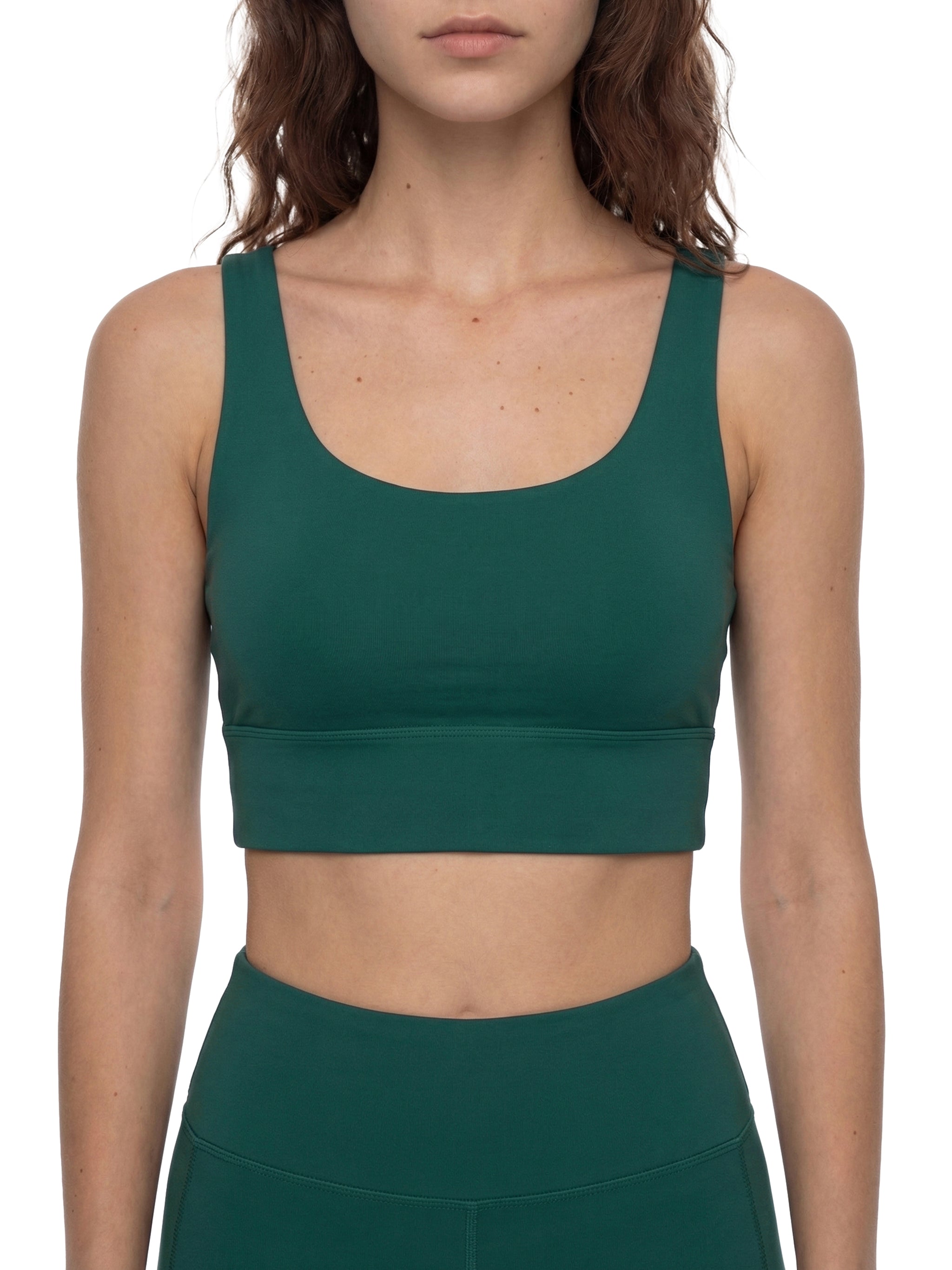 ODMPOD strappy criss-cross sports bra with supportive design, shown on a white background.