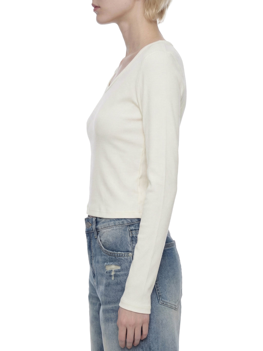 ODMPOD ruched long sleeve crop T-shirt displayed on a model with a fitted style and casual design.