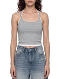 Contrast binding halter tank top by ODMPOD featuring a stylish halter neckline and sleek design, shown on a model.