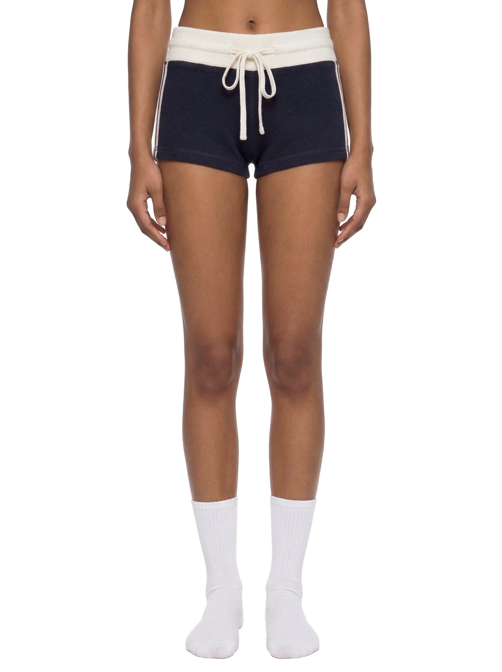 ODMPOD contrast stripe track shorts featuring bold stripe details and comfortable athletic fit, ideal for active wear.