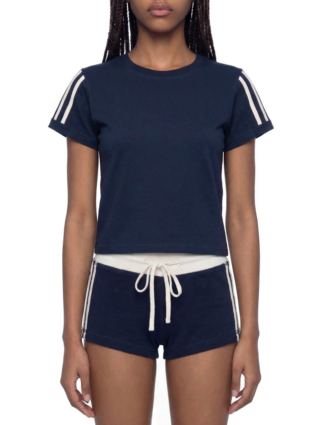 White ODMPOD varsity stripe T-shirt with sporty design and contrasting stripe details on the chest.