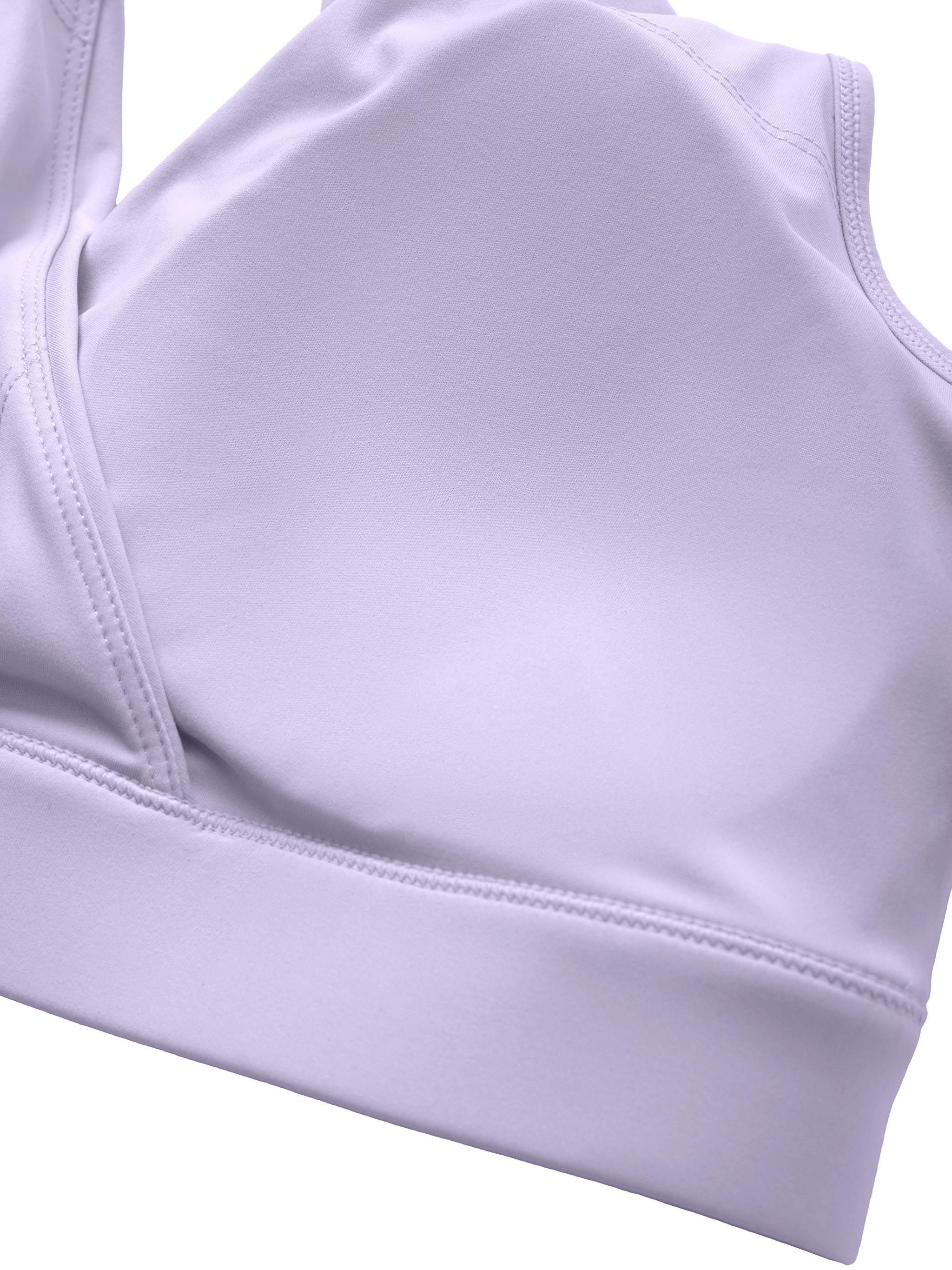 ODMPOD crossover V-neck sports bra shown in black with supportive design and wide shoulder straps for active wear.