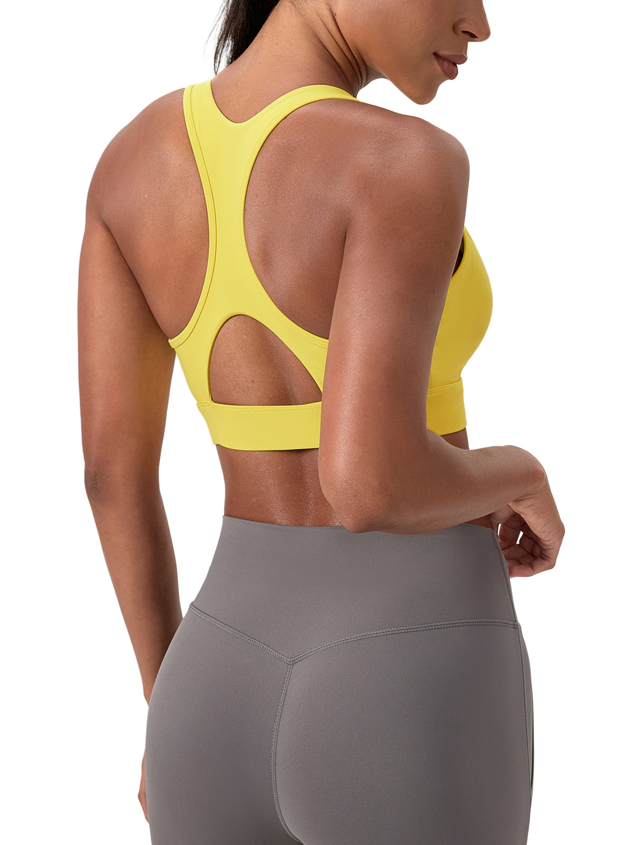 ODMPOD crossover V-neck sports bra with supportive design, white color, and breathable fabric for active wear.