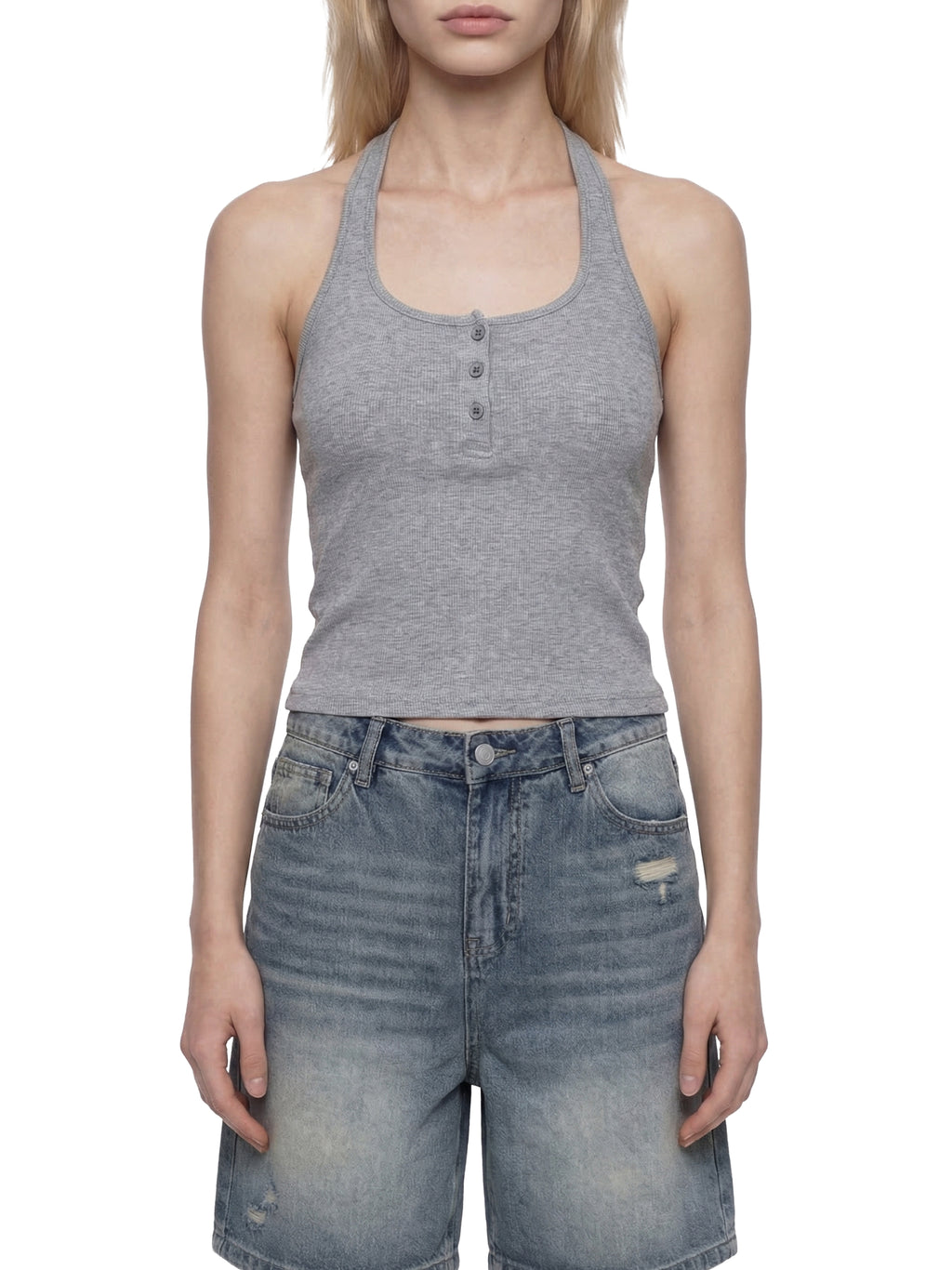 White ribbed Henley tank top by ODMPOD, close-up showing textured fabric and button details on the sleeveless shirt