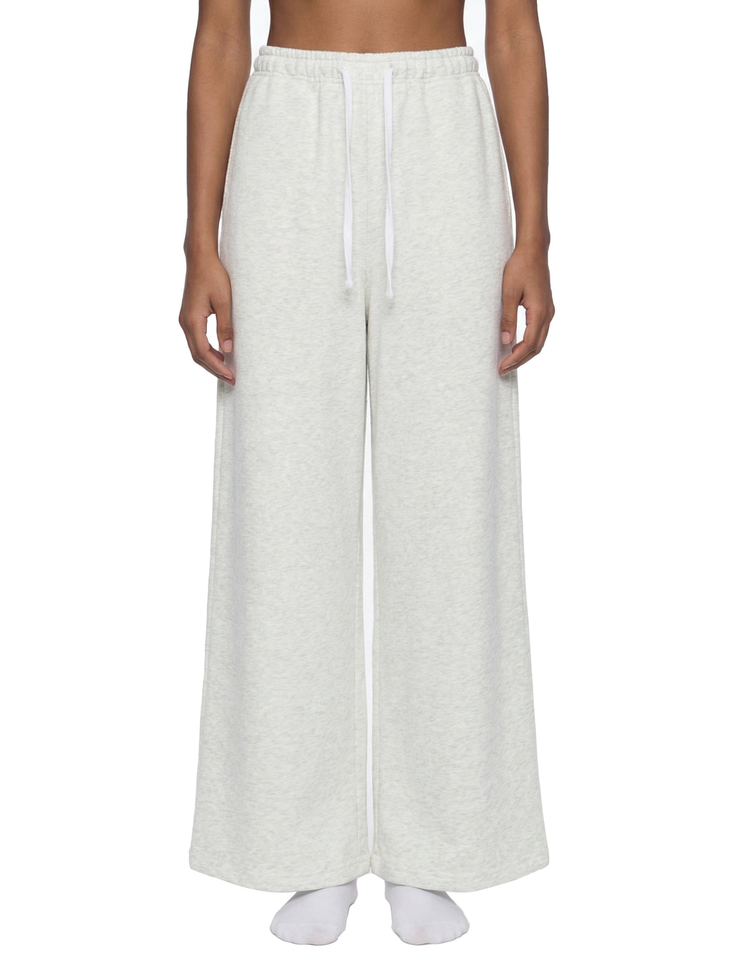ODMPOD wide leg sweatpants shown in soft fabric with a relaxed fit and elastic waistband, perfect for casual wear.