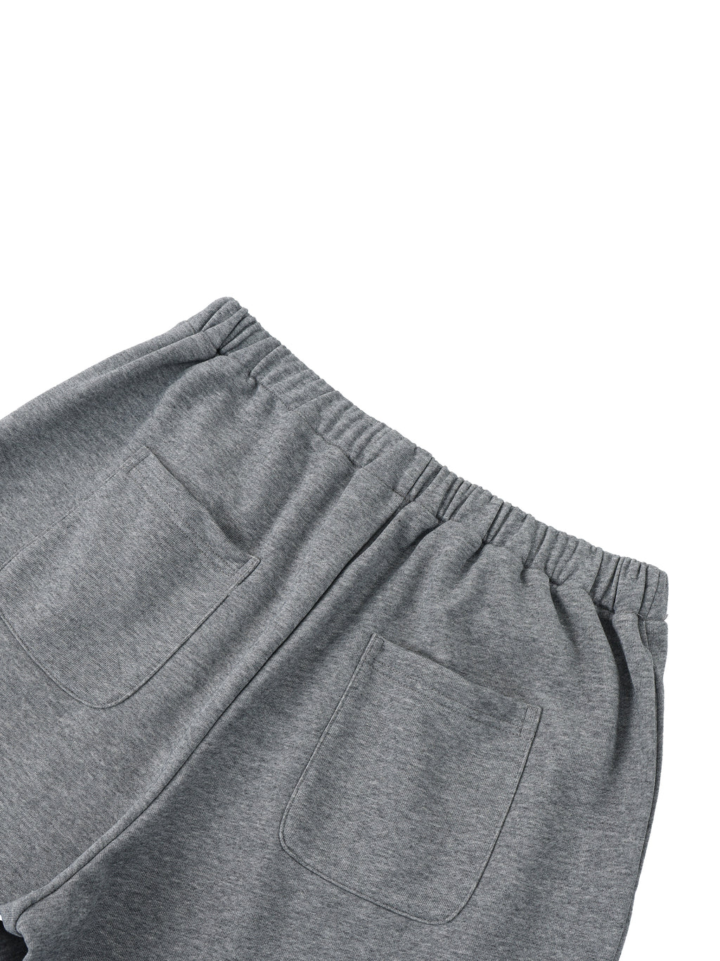 ODMPOD wide leg sweatpants laid flat, showing soft fabric, elastic waistband, and relaxed fit for casual comfort.