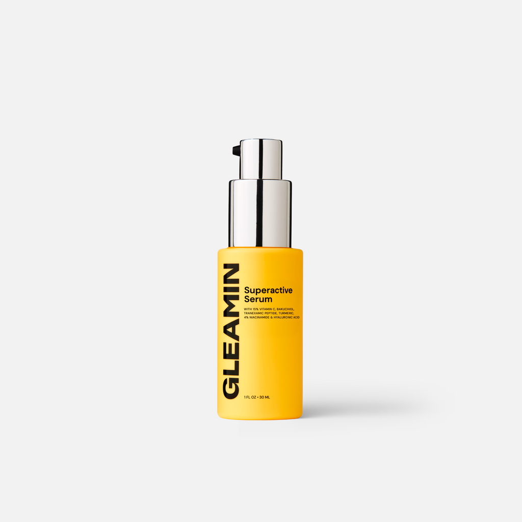 Gleamin Superactive Face Serum in a clear bottle with a dropper, showcasing the skincare product for glowing skin.