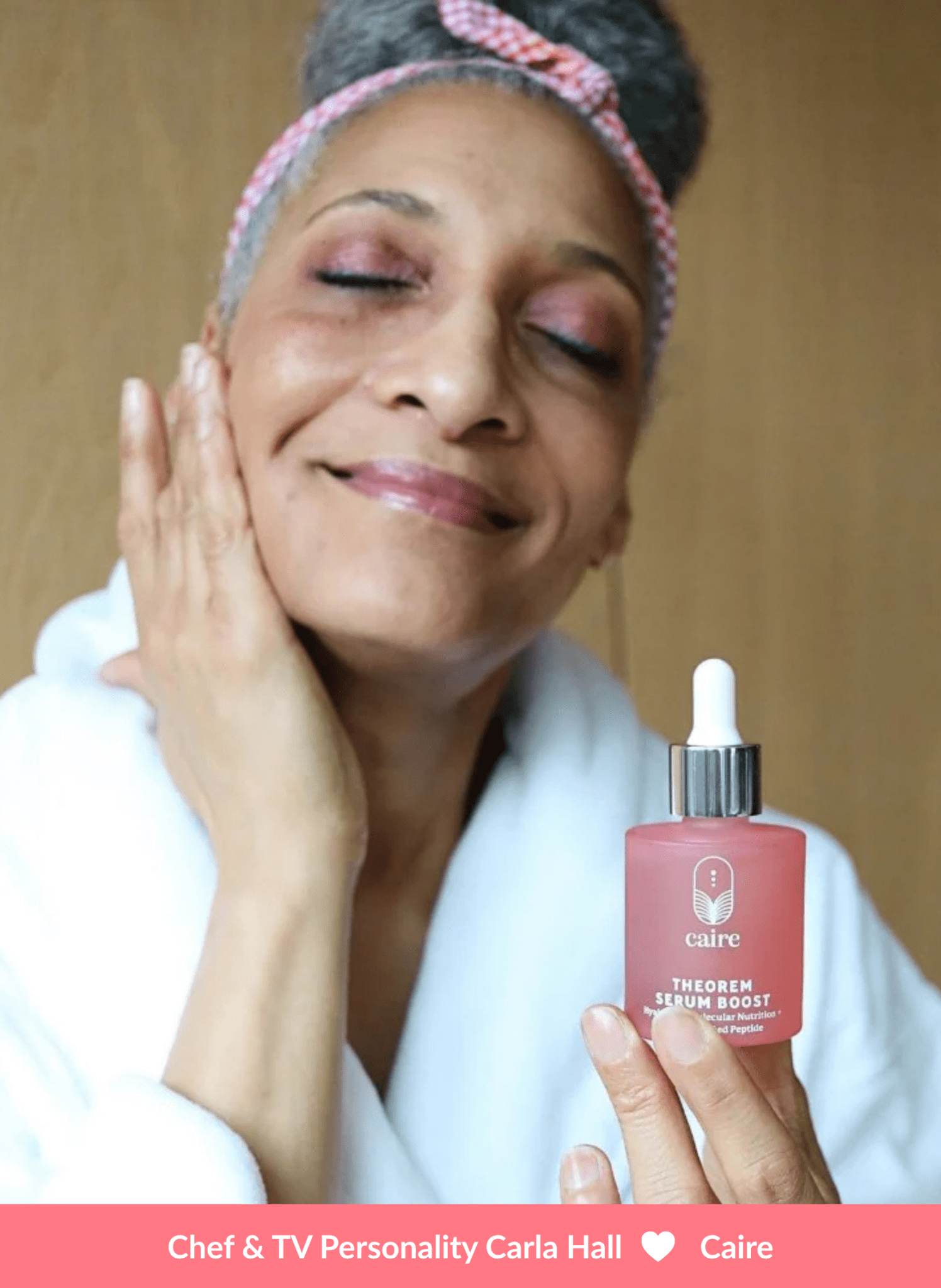 Caire Beauty Theorem Serum Boost bottle with dropper, clear serum inside, on a white background for skincare product display.